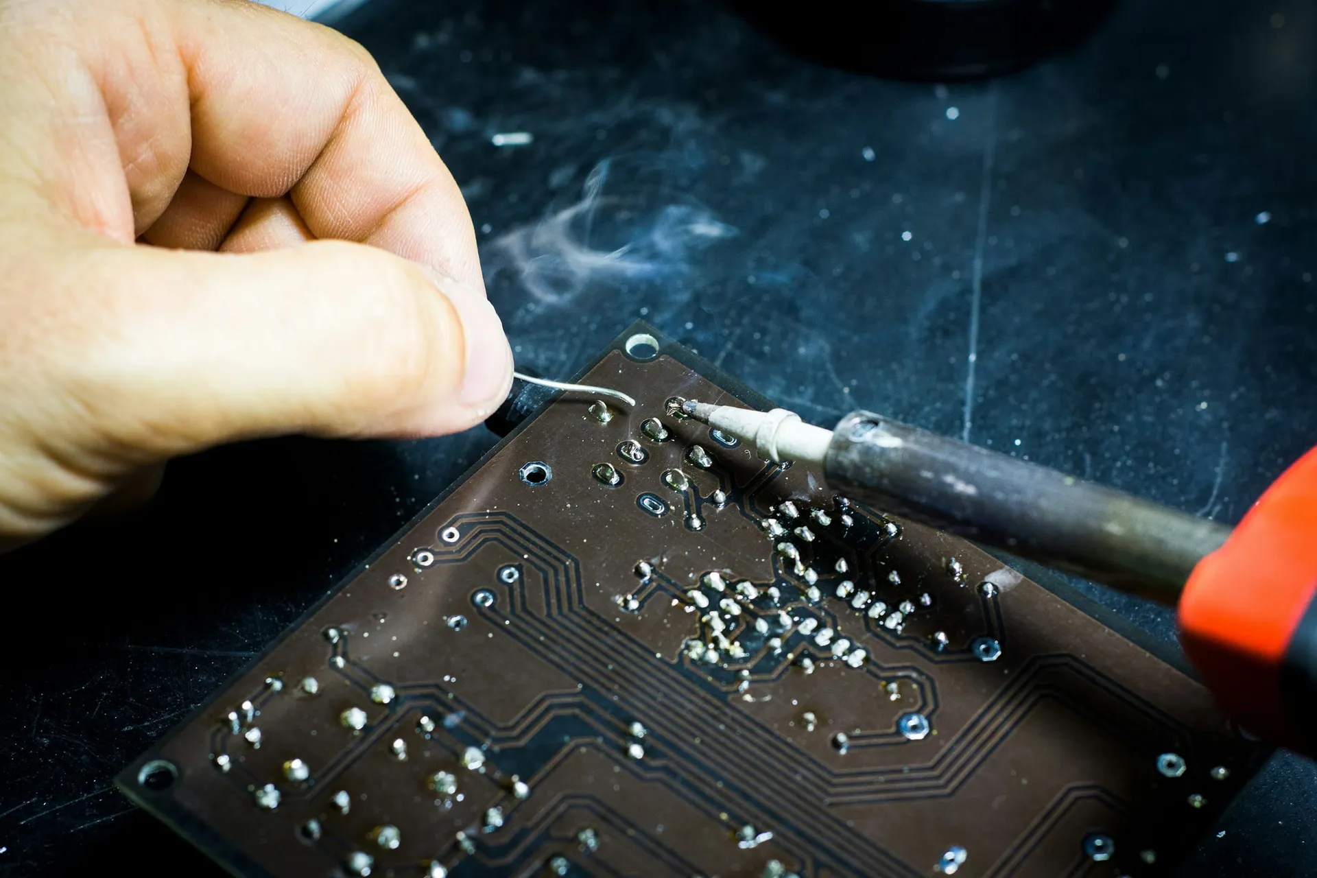 Hand soldering a component onto a circuit board